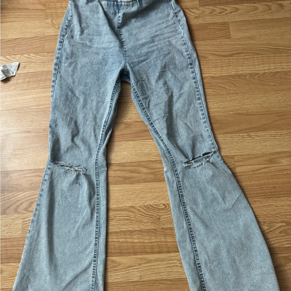 Distressed Light Blue Denim Jeans
